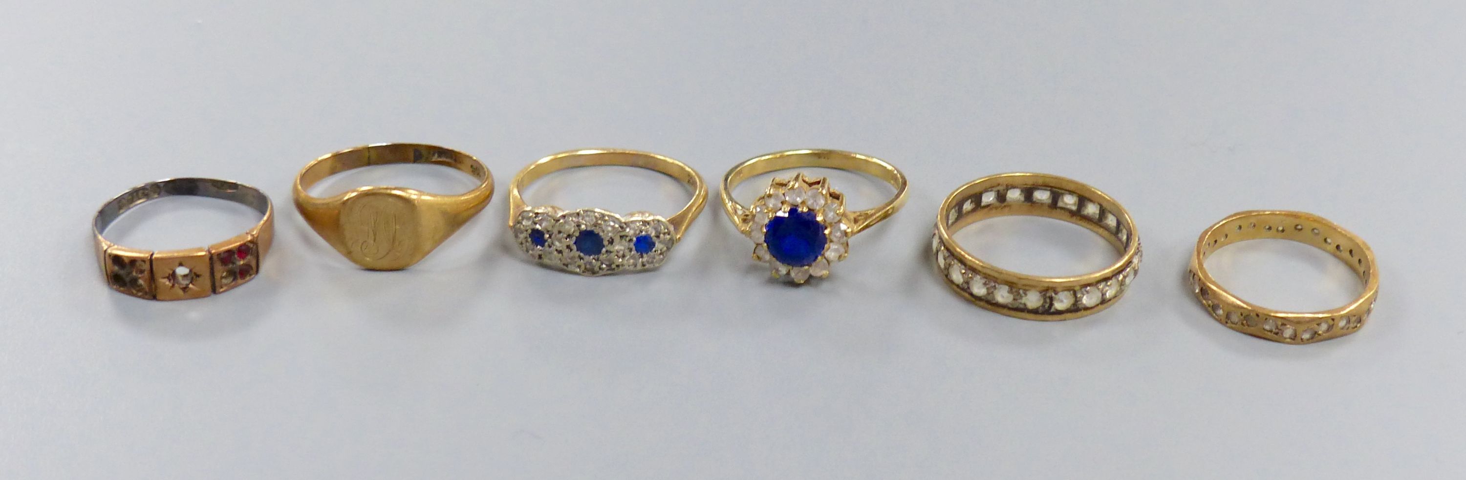 Six 9ct gold rings, variously gem or paste-set, gross 13.7 grams.